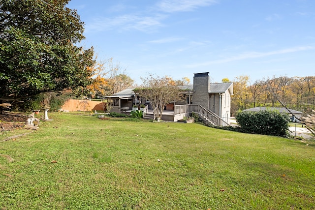 view of yard with a sunroom