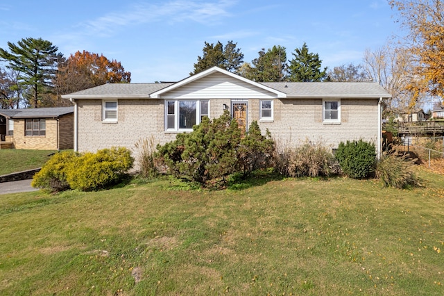 view of front of home with a front yard