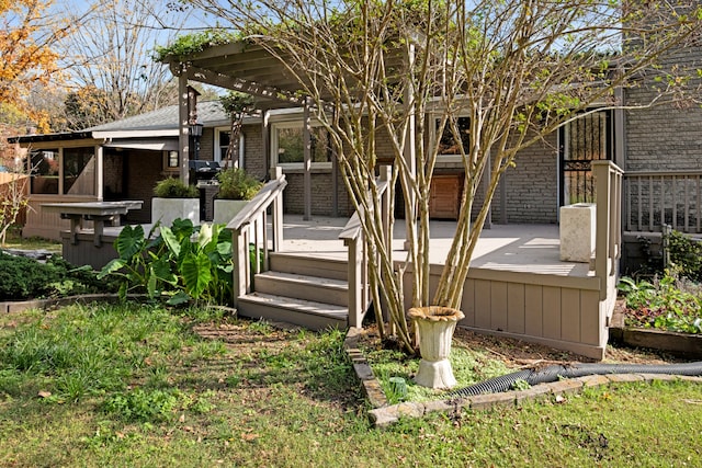 exterior space featuring a pergola and a wooden deck