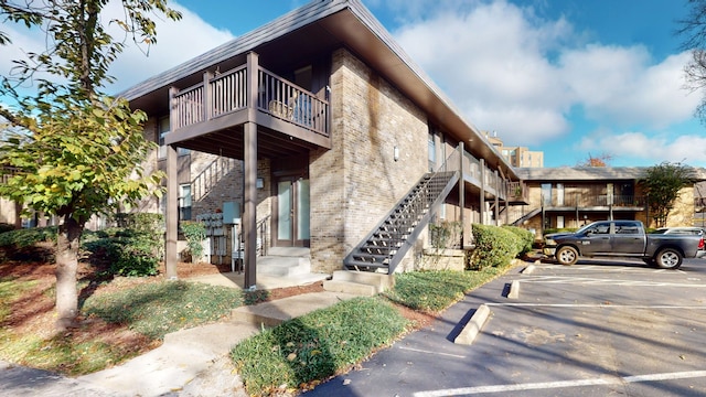 view of property exterior with a balcony