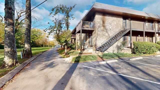 view of property exterior with a balcony