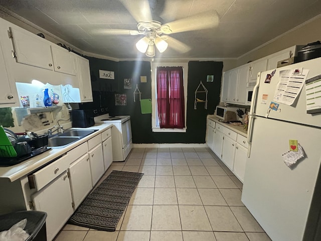 kitchen featuring sink, white cabinets, crown molding, white appliances, and light tile patterned floors