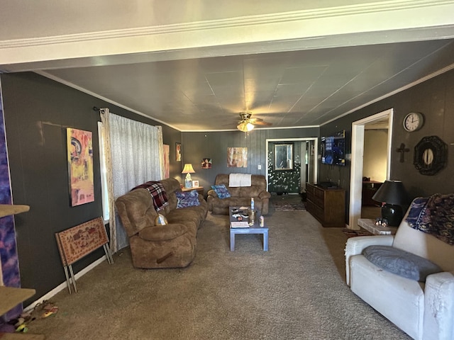 living room with ceiling fan, carpet floors, and ornamental molding