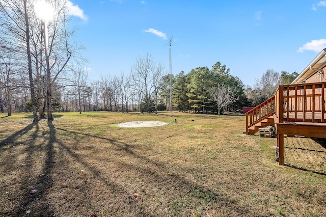 view of yard with a deck