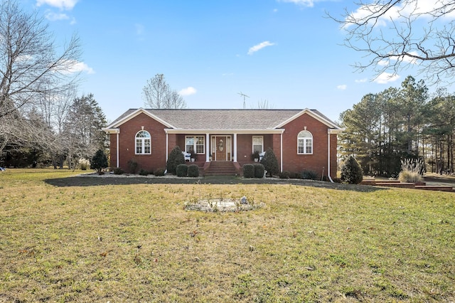 ranch-style home with a front lawn