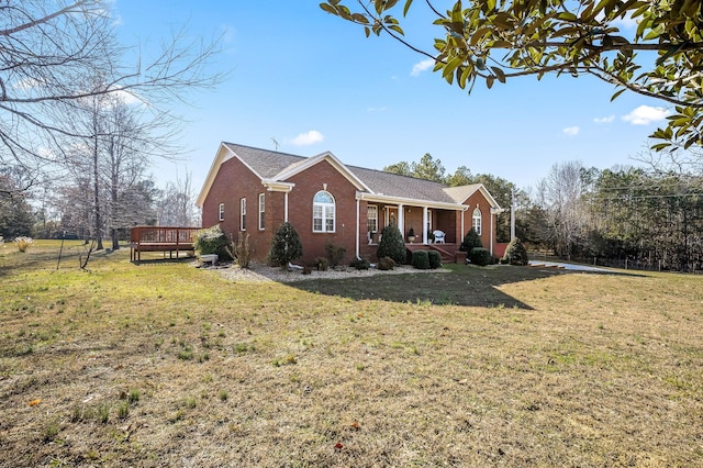 view of property exterior featuring a lawn, a wooden deck, and a porch