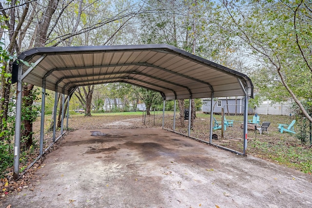 view of parking / parking lot featuring a carport