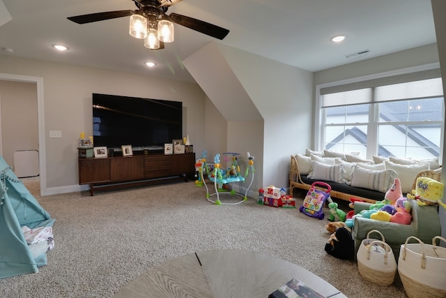 rec room featuring carpet floors and ceiling fan