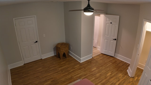 spare room featuring ceiling fan and hardwood / wood-style floors