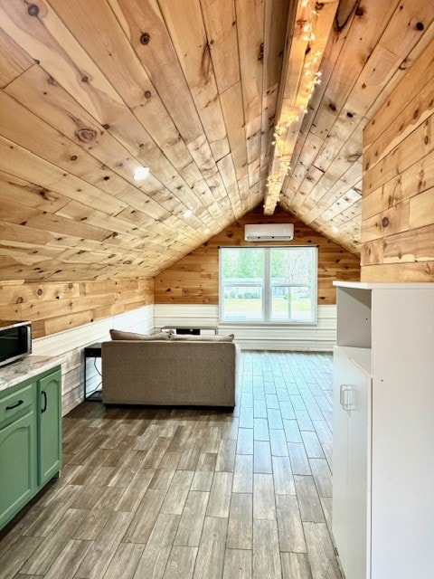 additional living space featuring wood walls, wooden ceiling, lofted ceiling, and hardwood / wood-style flooring