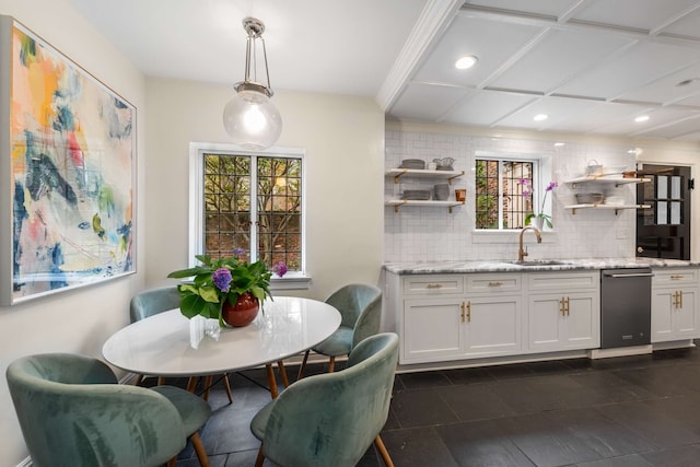 dining area featuring sink