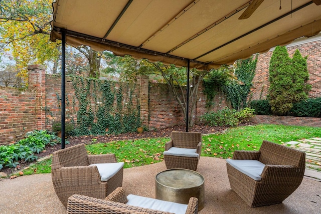 view of patio with ceiling fan