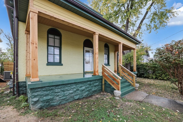 view of front of house featuring central air condition unit and covered porch