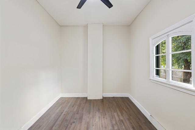 unfurnished room with ceiling fan and wood-type flooring