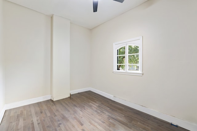 unfurnished room featuring ceiling fan and hardwood / wood-style floors