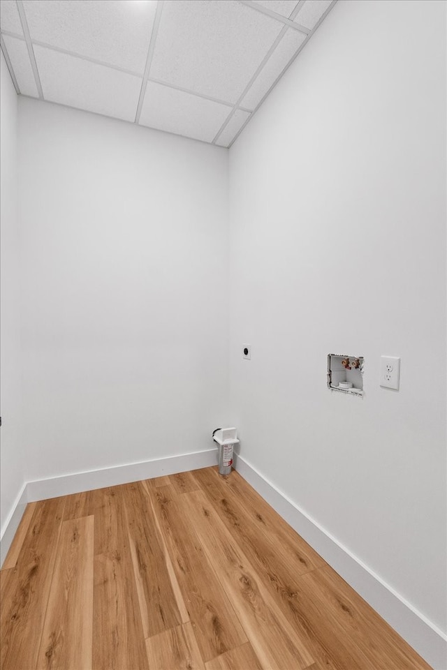 laundry area featuring hookup for an electric dryer, washer hookup, and hardwood / wood-style flooring