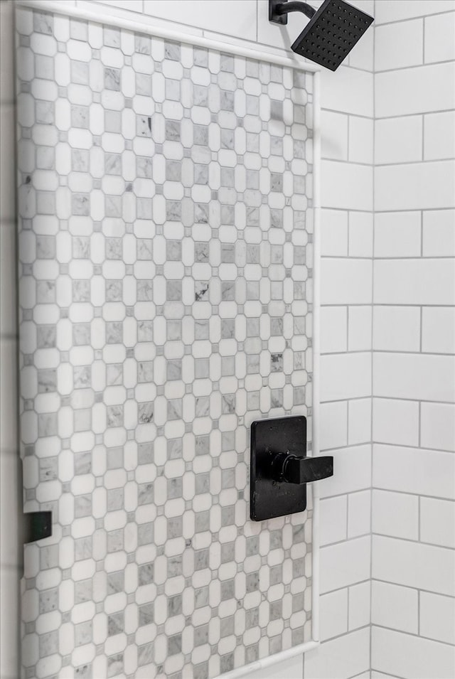 details with a tile shower