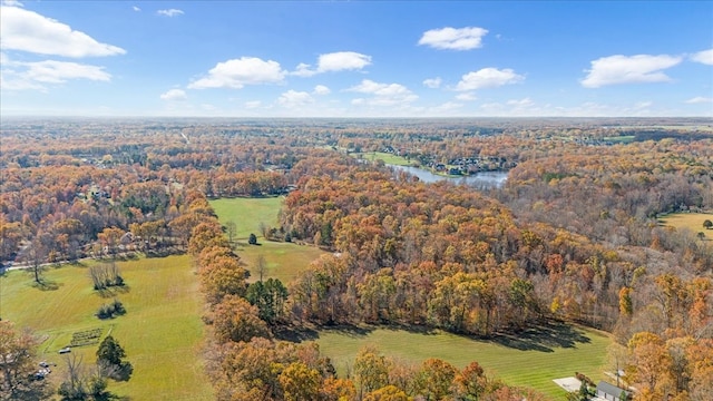 birds eye view of property featuring a rural view and a water view