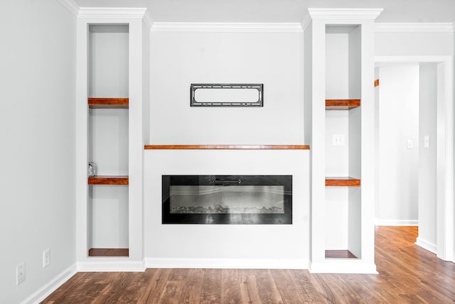 room details featuring built in shelves, wood-type flooring, and ornamental molding