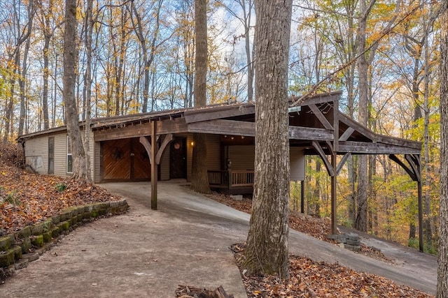 exterior space featuring a carport