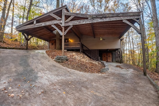 view of parking / parking lot with a carport