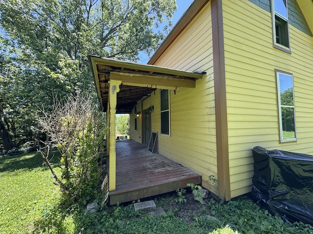 view of home's exterior with a deck