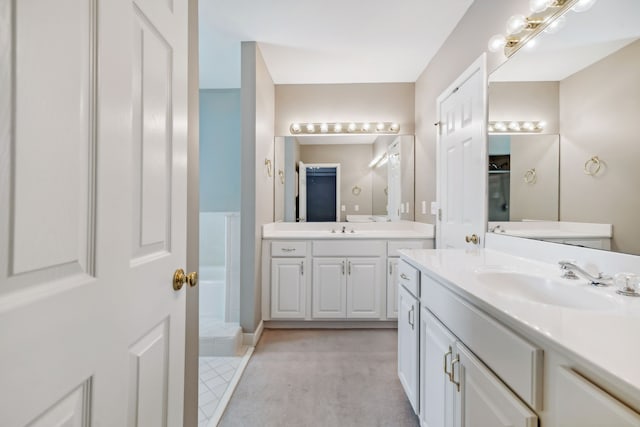 bathroom featuring vanity and walk in shower