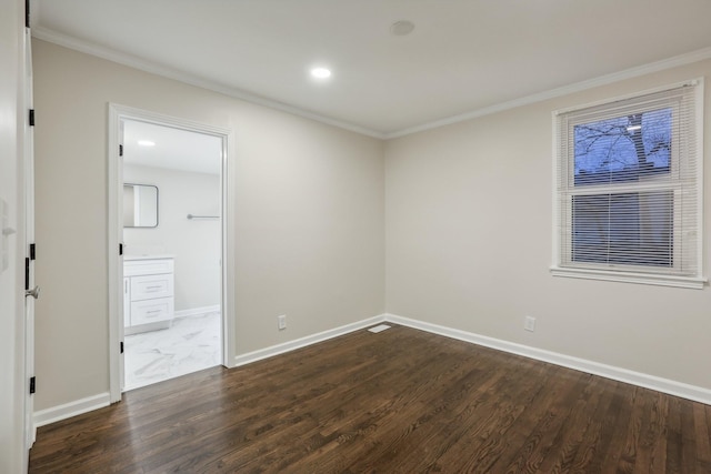 unfurnished room with crown molding and dark wood-type flooring