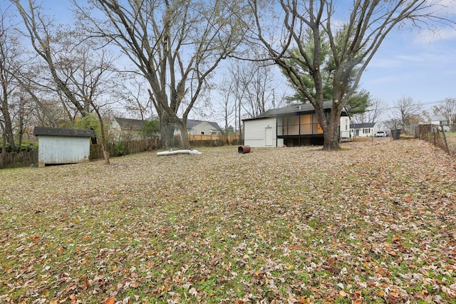 view of yard with a storage shed