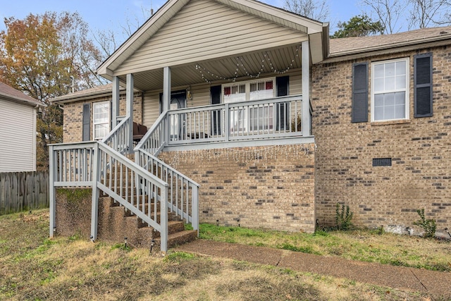 view of front of home featuring covered porch