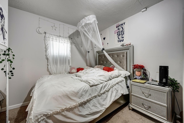 bedroom featuring a textured ceiling