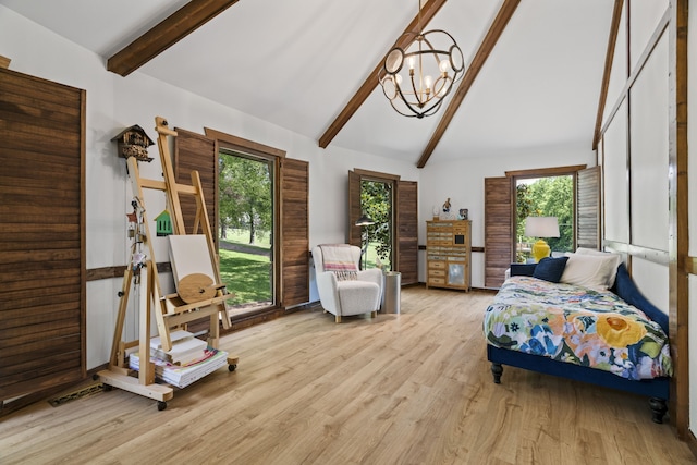 bedroom with lofted ceiling with beams, light hardwood / wood-style flooring, and a notable chandelier