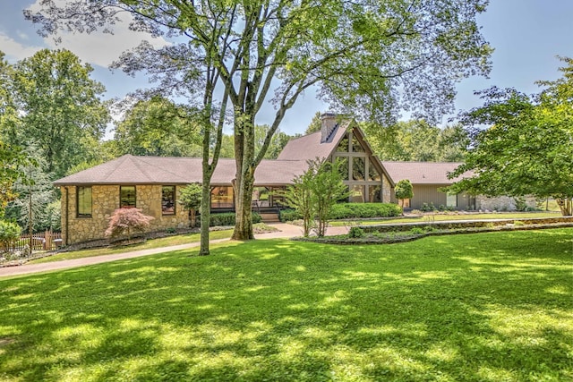 view of front of home with a front lawn