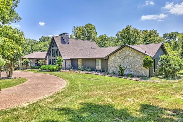 view of front of home with a front yard