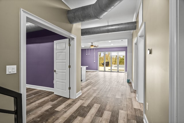 corridor featuring hardwood / wood-style floors