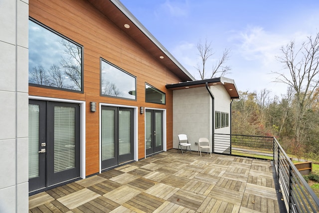 wooden terrace featuring french doors