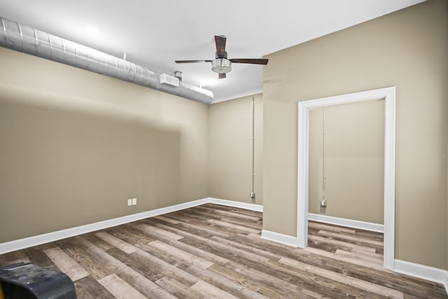 unfurnished bedroom featuring ceiling fan and hardwood / wood-style floors