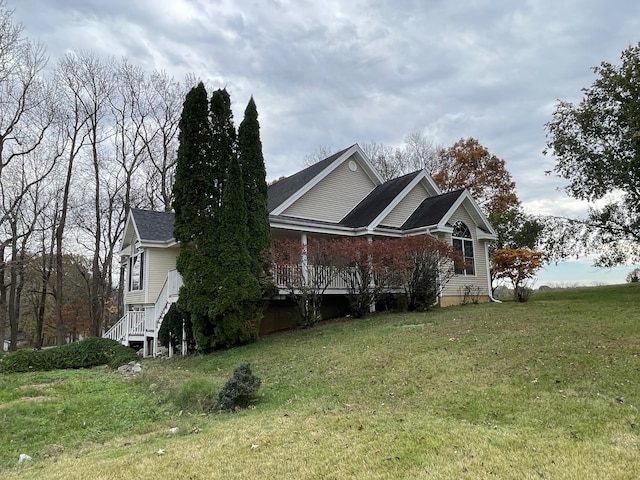 view of home's exterior featuring a yard