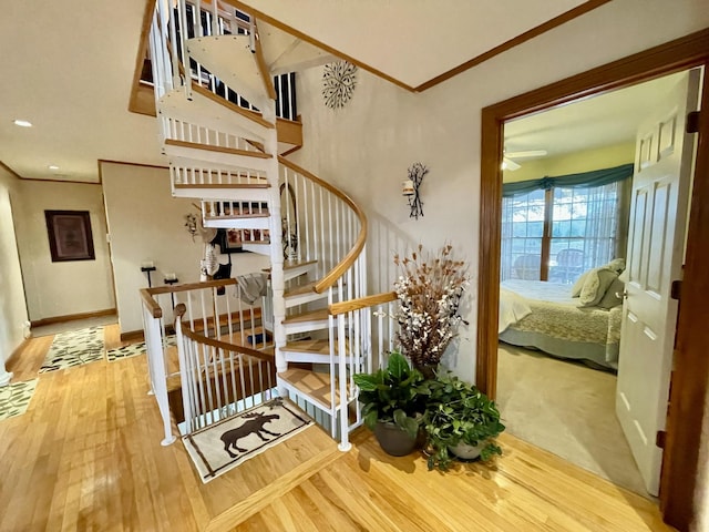 314 Birdsong Dr, Cadiz, KY 42211 - staircase featuring crown molding, wood finished floors, and a ceiling fan