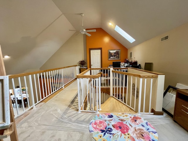 314 Birdsong Dr, Cadiz, KY 42211 - hall with a skylight, vaulted ceiling, carpet, and an upstairs landing
