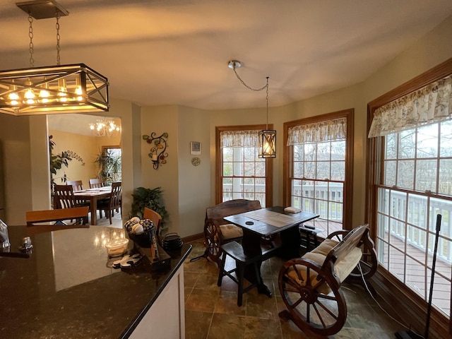 314 Birdsong Dr, Cadiz, KY 42211 - dining area featuring a chandelier and baseboards