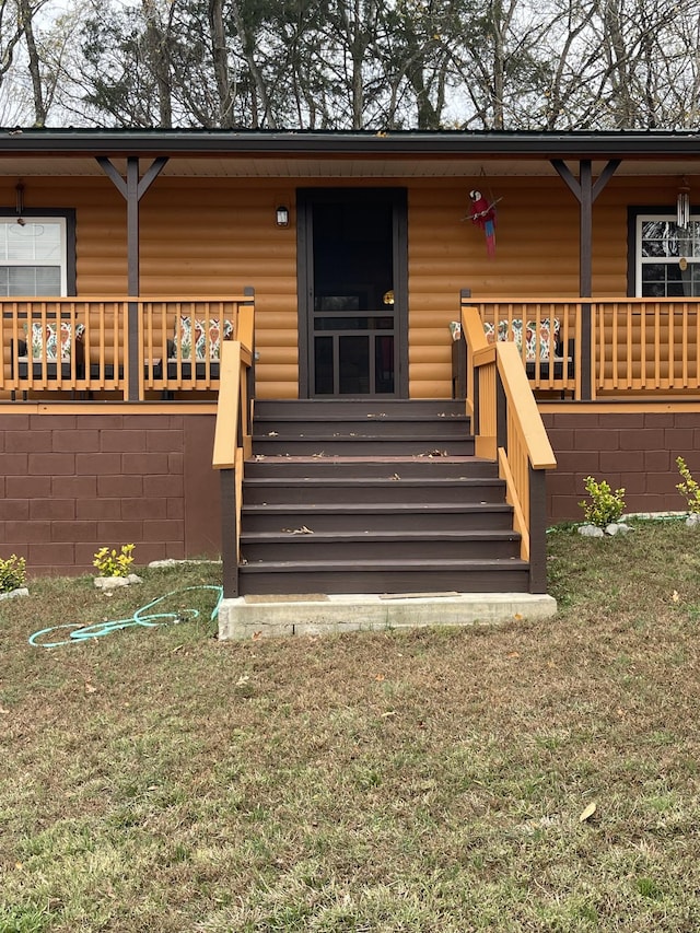 314 Birdsong Dr, Cadiz, KY 42211 - entrance to property with log veneer siding and a yard