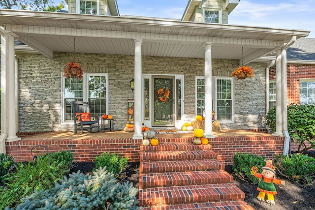 entrance to property with covered porch