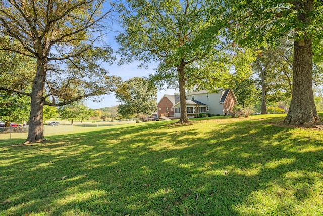 view of yard featuring fence