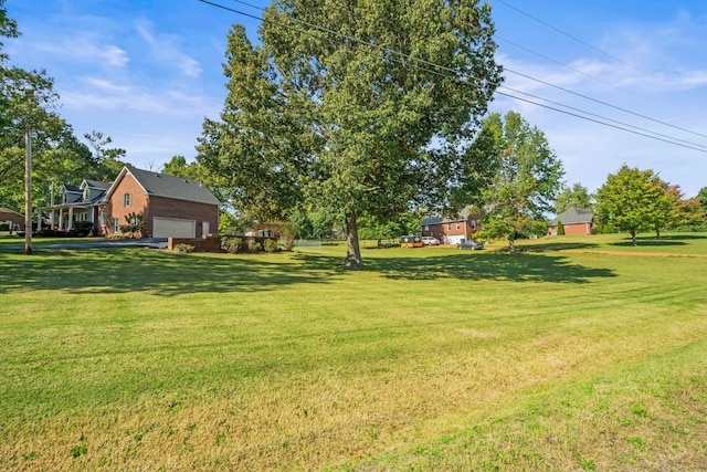 view of yard with a garage