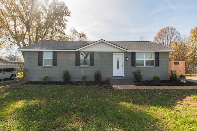 single story home with a front lawn