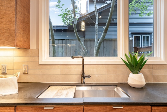 interior details with sink and tasteful backsplash