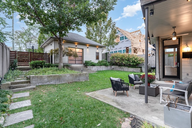 view of yard with outdoor lounge area and a patio