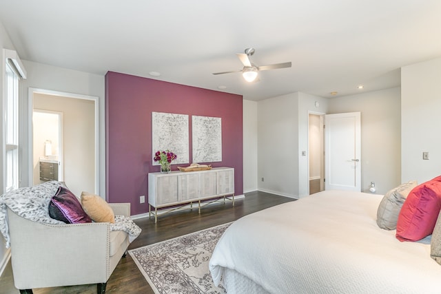 bedroom featuring ceiling fan and dark hardwood / wood-style flooring