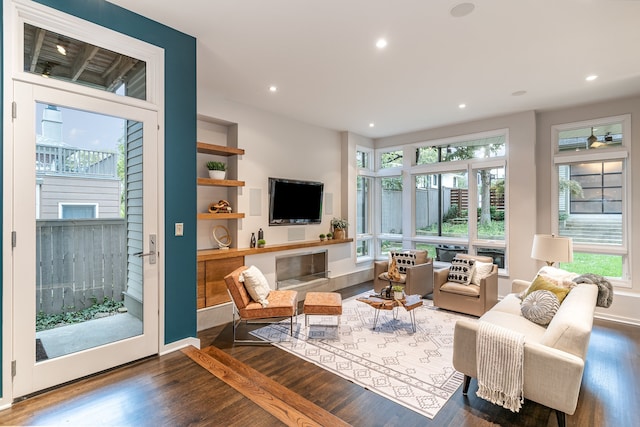 living room featuring dark hardwood / wood-style floors